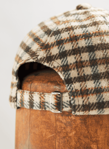 Hellkarierte Schirmmütze