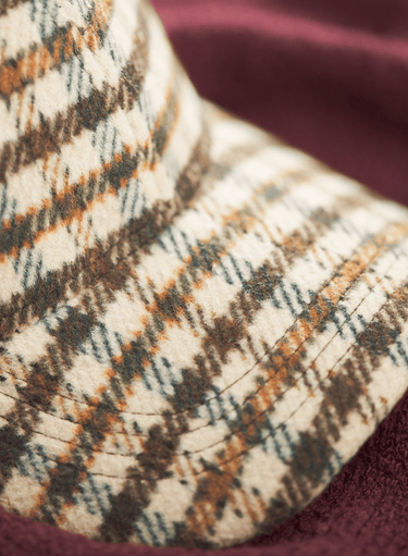 Hellkarierte Schirmmütze